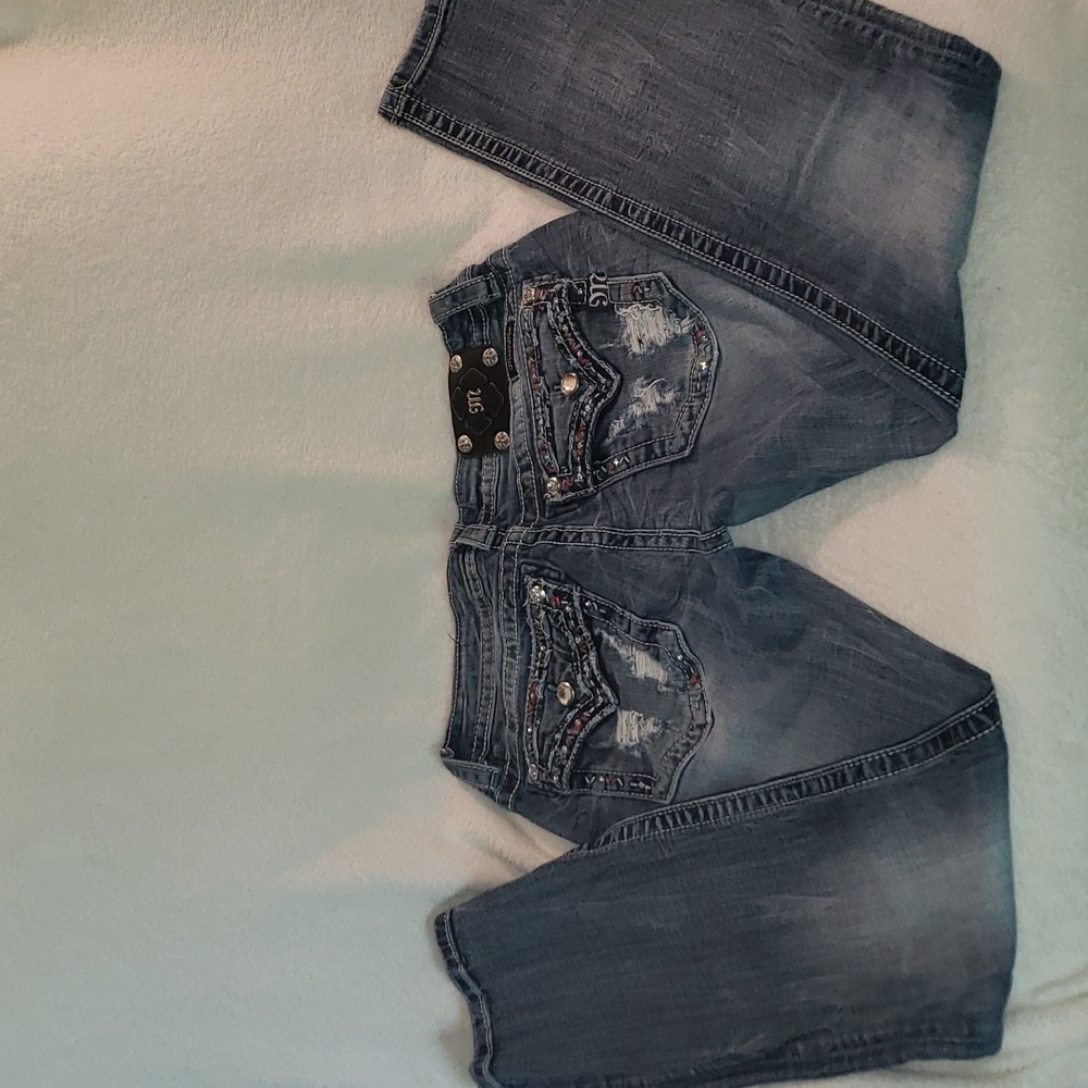 Miss me jeans size 30 with a 31 inseam blue, turquoise, and red embellishments